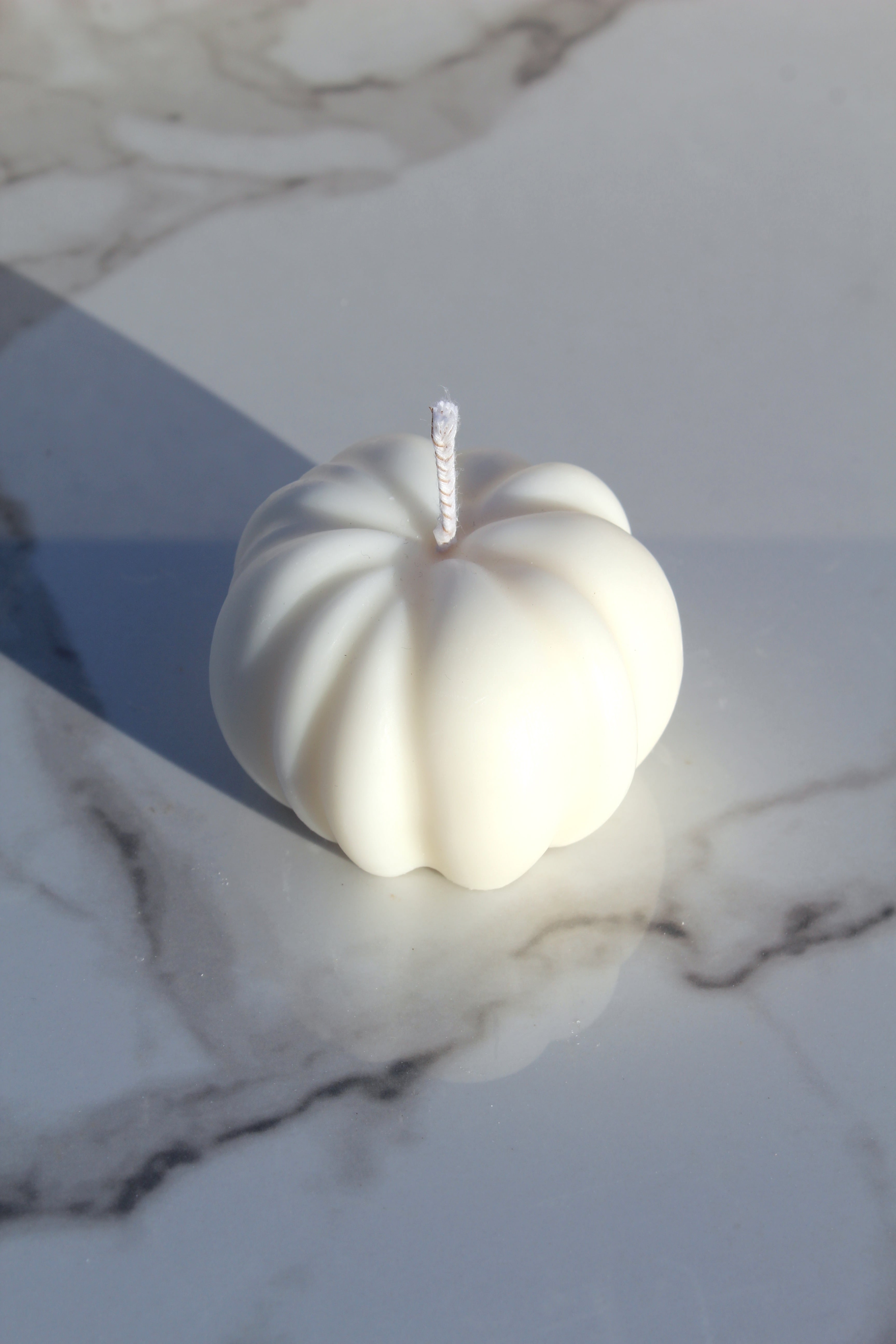 Pumpkin shaped candle